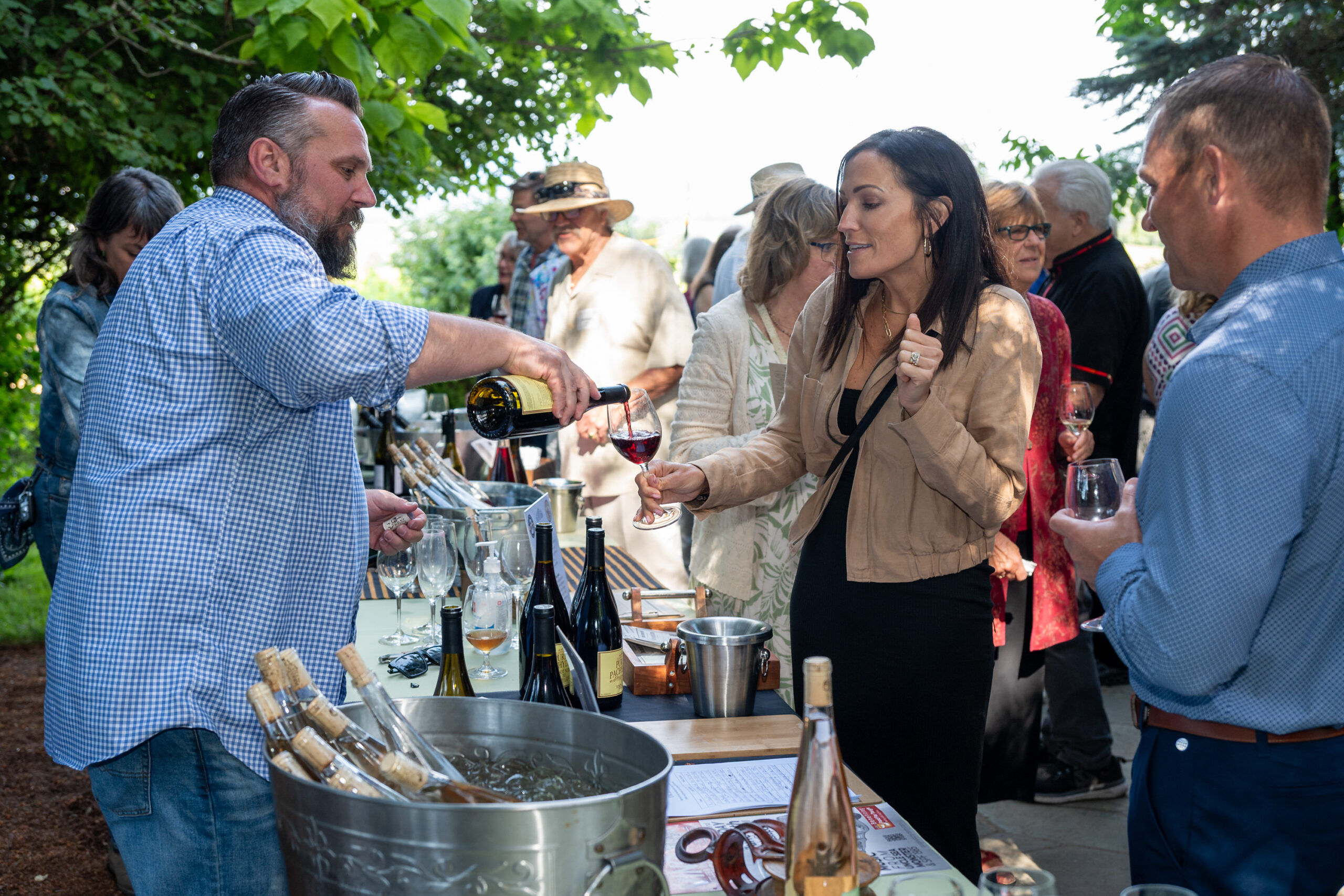 Taste West County pouring wine in the wine lounge