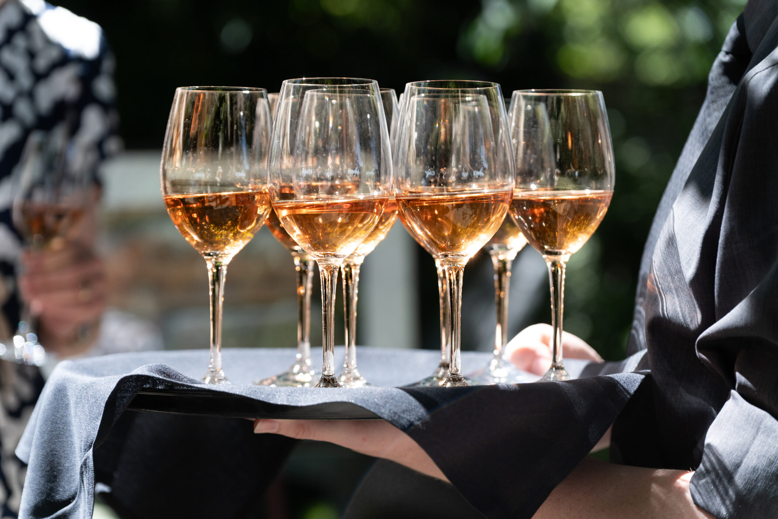 Glasses of rosé wine on a tray